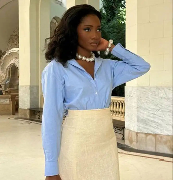 Black girl in blue dress